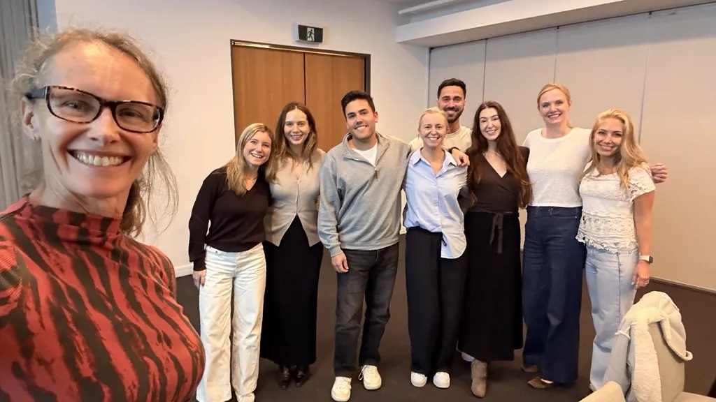 A client team together after a TalentCode HR onsite session